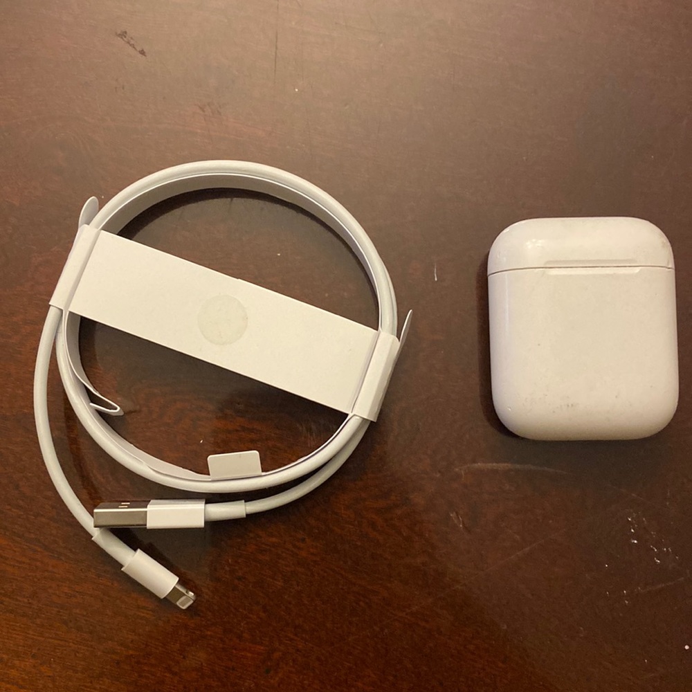 Apple AirPods First Generation charging cable and charging case.No AirPods